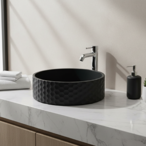 Black textured round basin on a white background